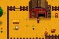 Stardew Valley. The player is standing outside their red barn and there are 4 cows roaming around. 3 cows are Brown and one is White.