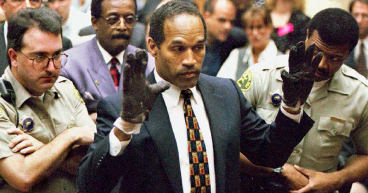OJ Simpson trying on gloves at court in 1996