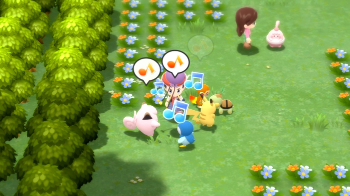 A Pokémon Trainer is spending time with various Pokémon in the Amity Square gardens of Pokémon Brilliant Diamond and Shining Pearl. The Pokémon include Turtwig, Chimchar, Piplup, Clefairy, and Pikachu.