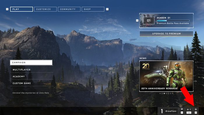 Halo Infinite's main menu screen, with an arrow pointing to the settings button.