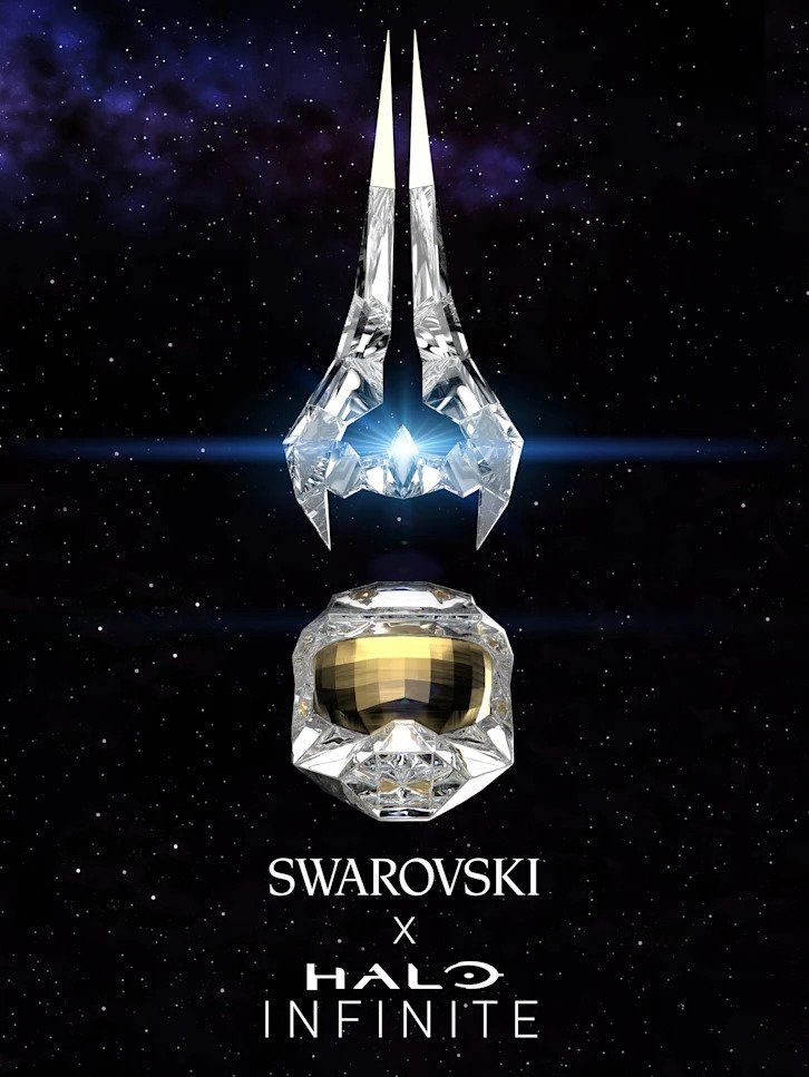 The Halo Infinite x Swarovski collectables, with the energy sword above the Mjolnir helmet.