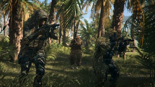 DMZ players wearing ghillie suits moving through forest