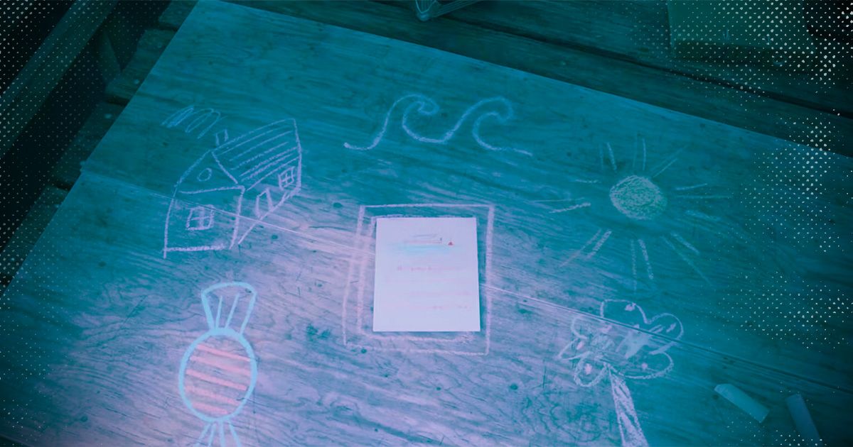 Alan Wake 2 fisherman riddle laying on a pier with childlike chalk drawings surrounding it