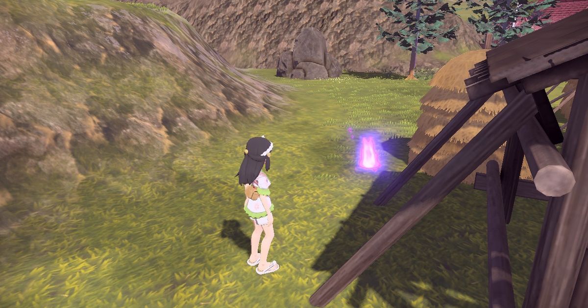 A player interacts with a Wisp in Jubilife Village in Pokémon Legends: Arceus.