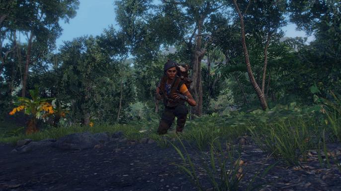 Dani Rojas of Far Cry 6 using stealth to sneak up on and hunt hares in the refgion of El Este, east of Lapida Mogote.