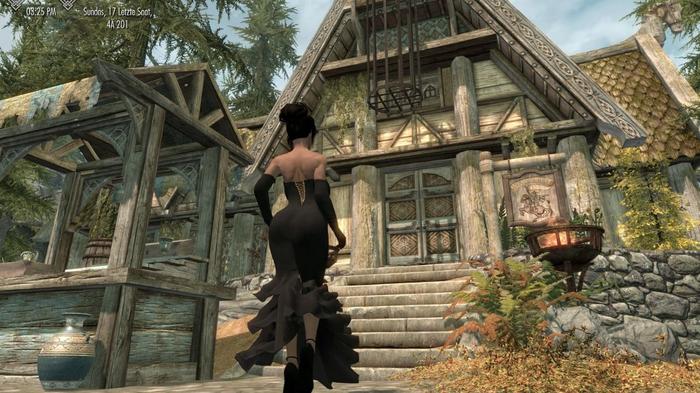 A woman walking into a tavern in Skyrim.