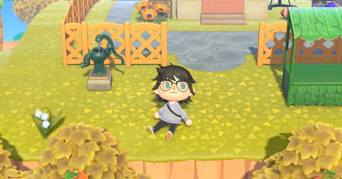 A player using the Sit Down reaction in Animal Crossing: New Horizons.