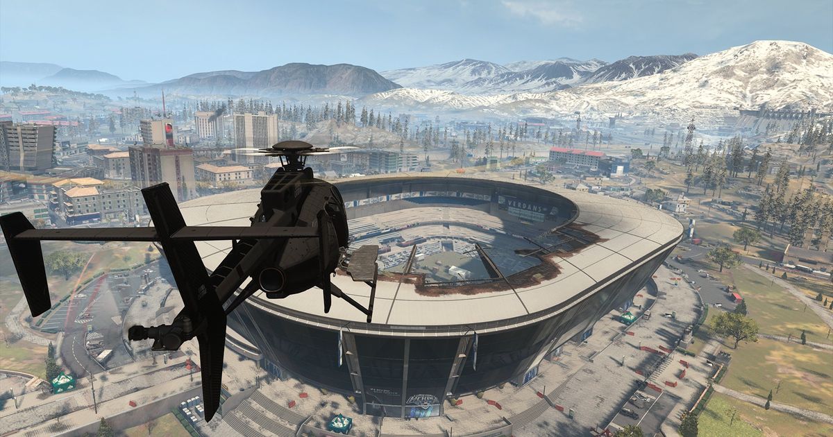 Modern Warfare 3 Verdansk Stadium with breached roof and flying helicopter in foreground