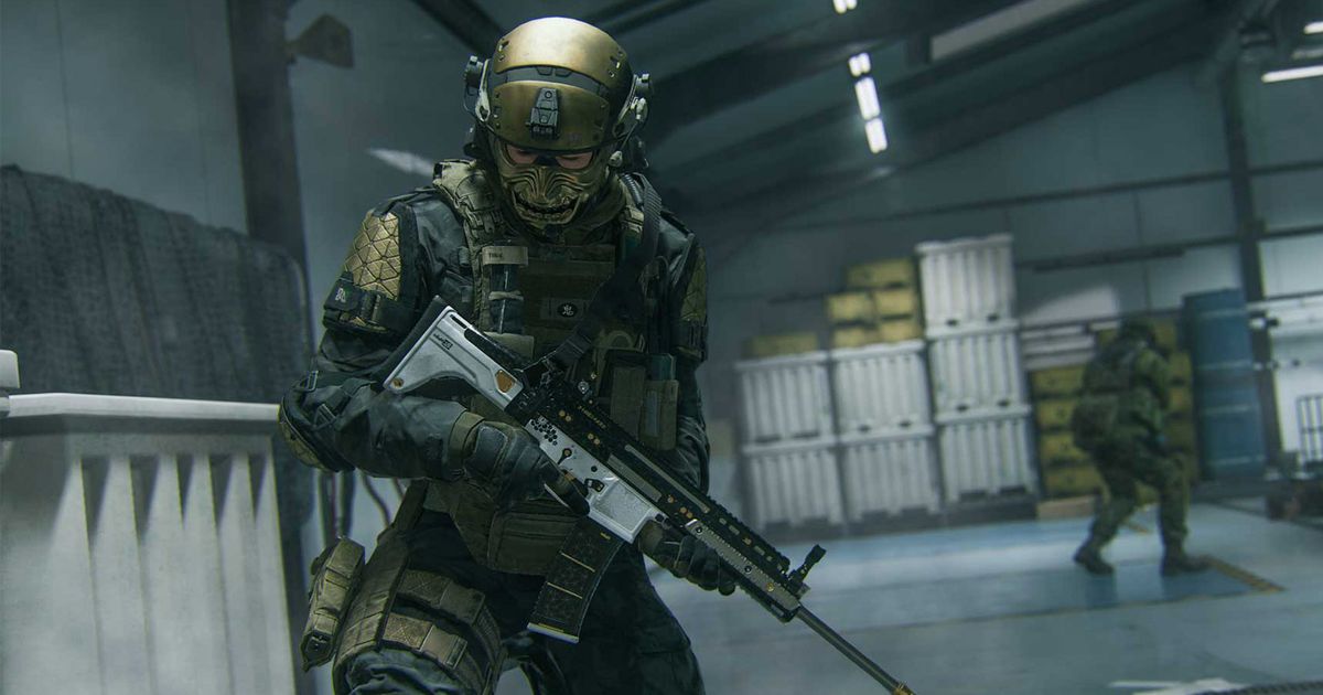 Screenshot of Modern Warfare 3 player holding assault rifle while looking down