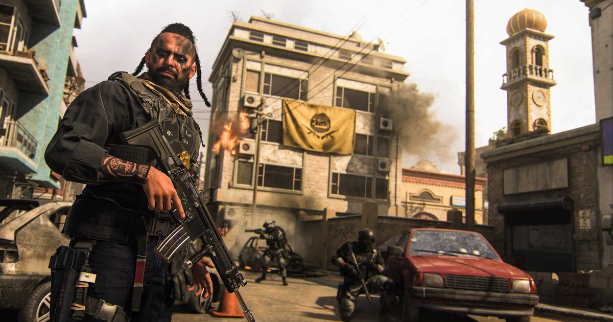 Modern Warfare 2 player holding gun with car and building in background