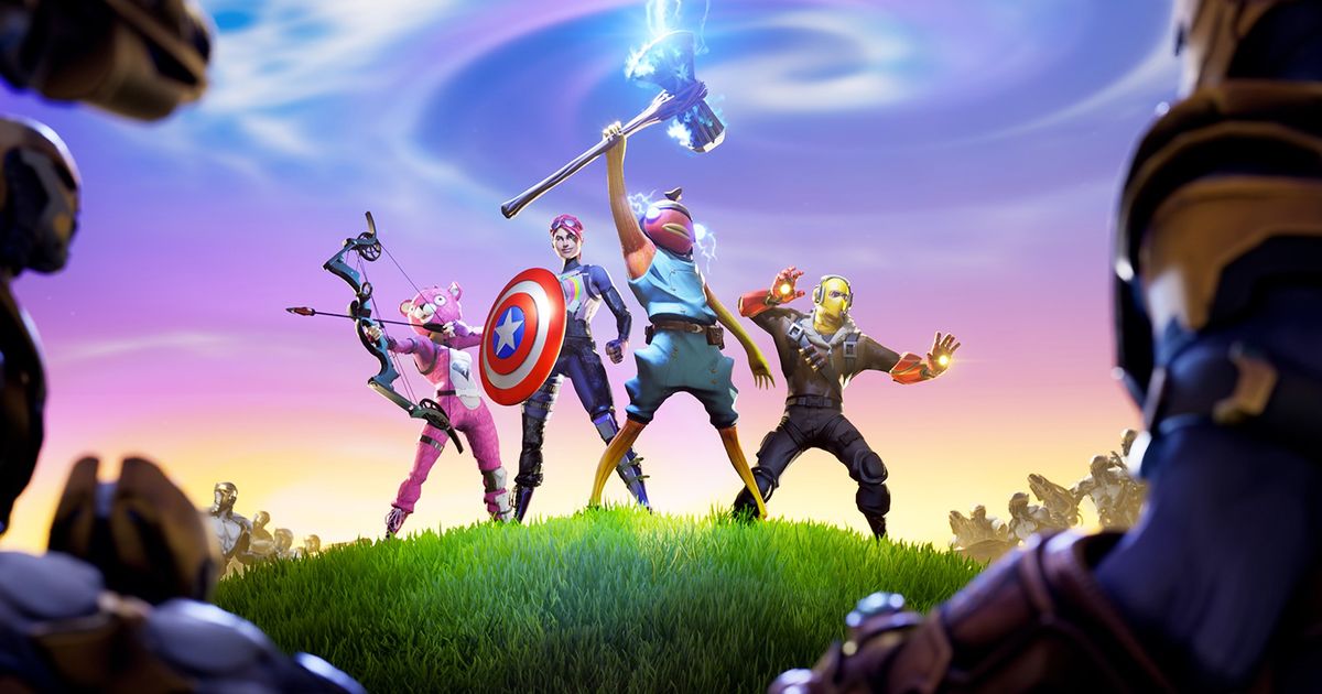 Image of Fortnite characters holding Marvel weapons atop a hill.