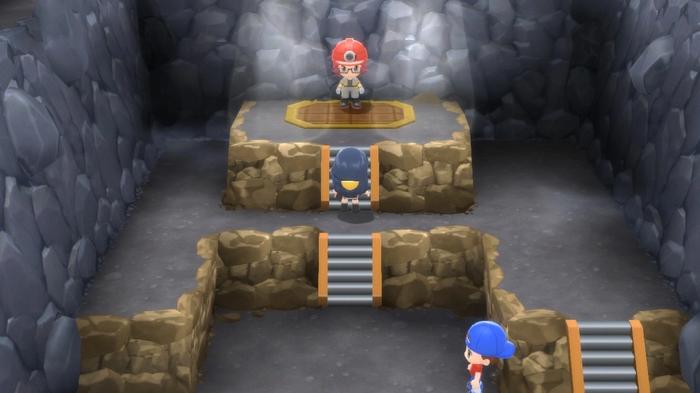 A Pokémon Trainer faces Roark in the Oreburgh City Gym of Pokémon Brilliant Diamond and Shining Pearl.