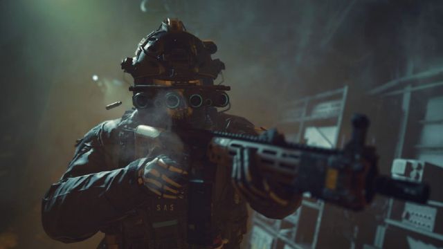 Screenshot of Warzone 2 player holding a smoking gun in the darkness