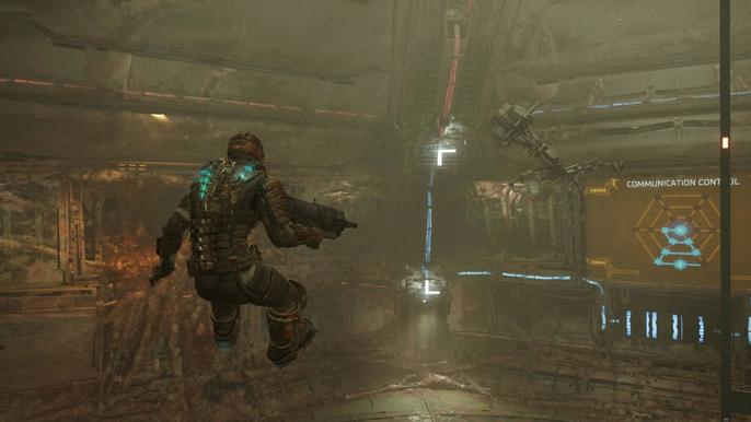 Isaac Clarke floating in mid-air while fixing the comms array in the Dead Space remake.