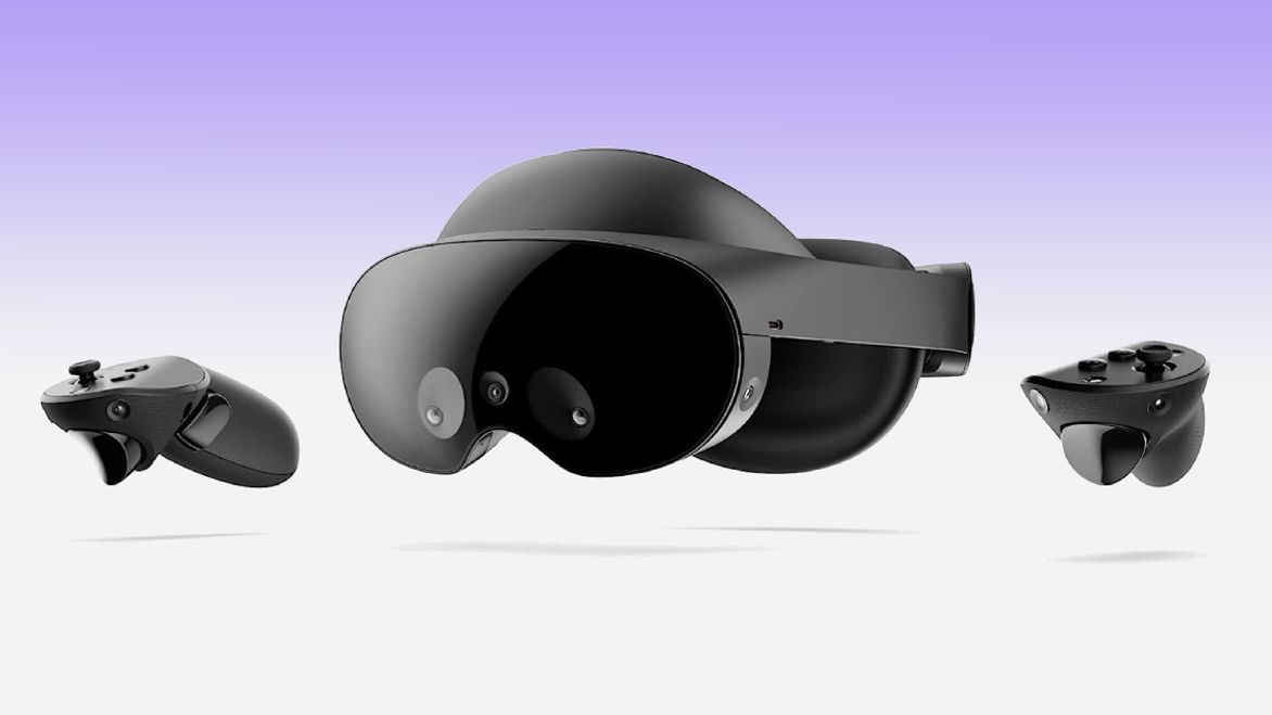 A black VR headset next to a pair of black controllers in front of a white and purple gradient background.