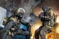 Modern Warfare 3 player pointing gun at soldier raising arm