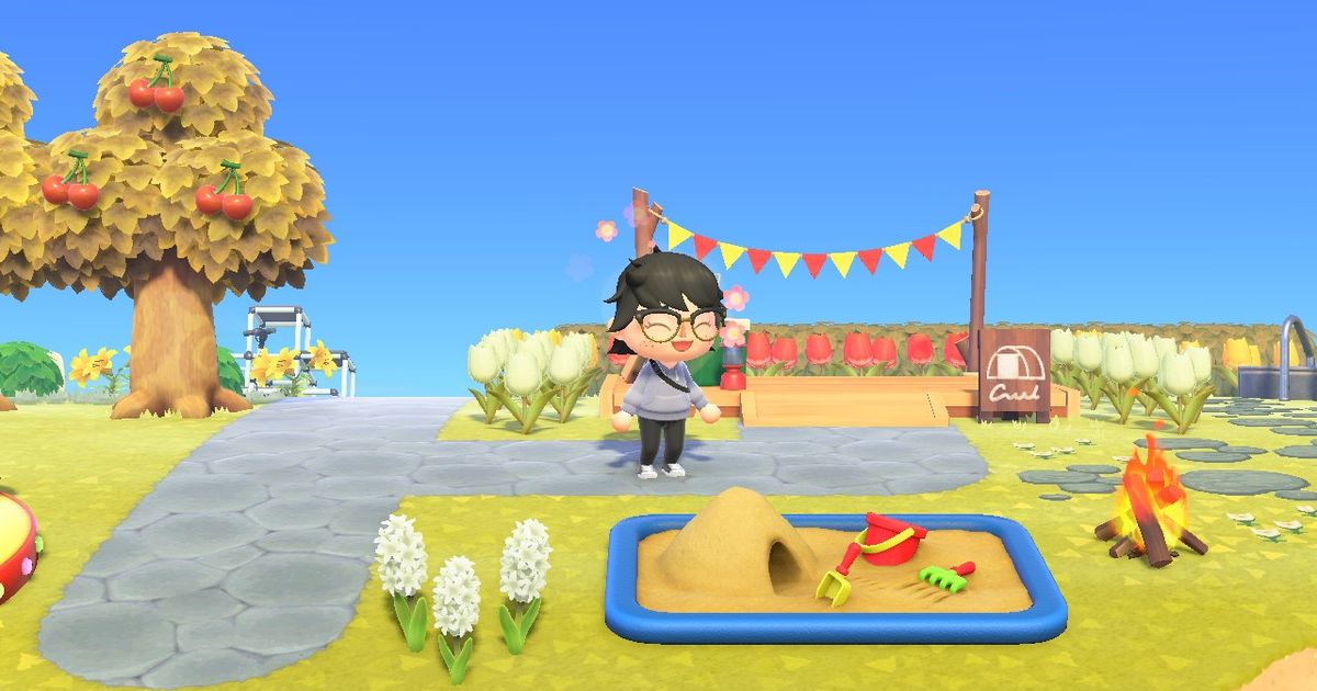 A player stood at the campsite, which can be used to invite new villagers to an island in Animal Crossing: New Horizons.
