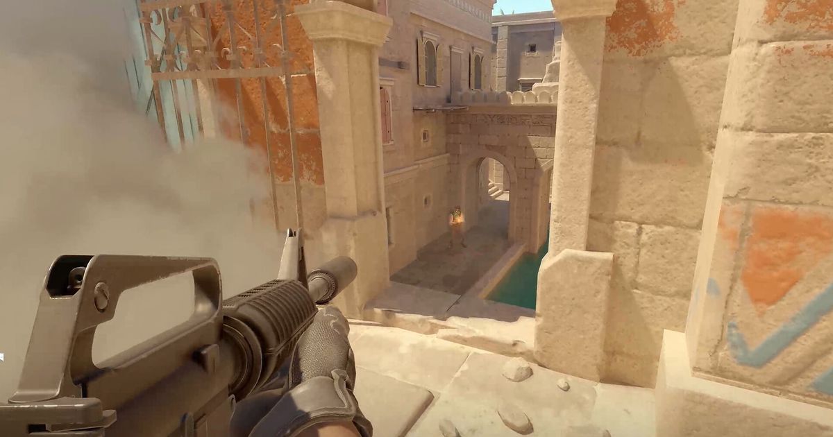 Counter Strike 2 gameplay with an assault rifle on the left side of the screen