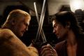 Two characters are fighting in Like a Dragon: Ishin.