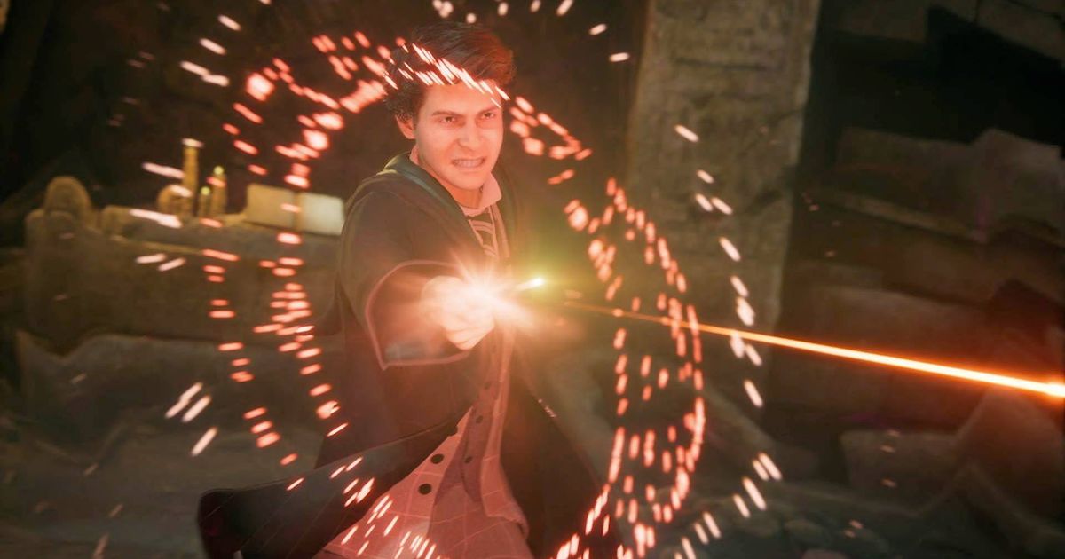 A male wizard casting a red spell in Hogwarts Legacy.