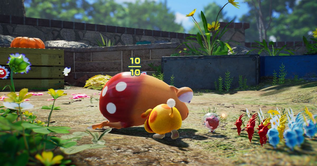Pikmin collecting a defeated enemy in Pikmin 4.