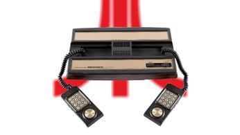 The Intellivision console with two controllers on an Atari background