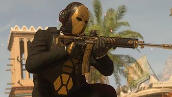 Screenshot showing Warzone 2 player holding an M4 assault rifle while wearing a solid gold mask