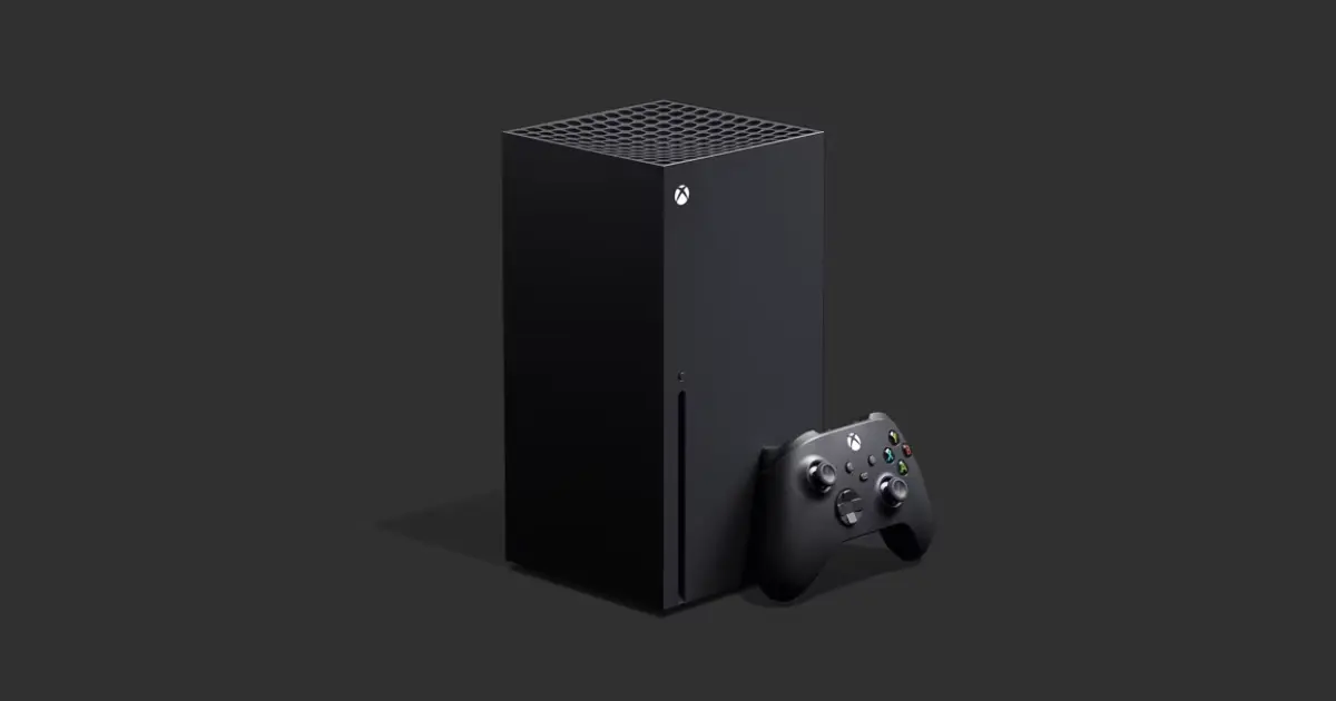 A black Xbox Series X with a controller leaning against it.