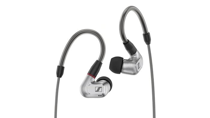 Best wired earbuds - Sennheiser IE 900 product image of two silver and black wired earbuds, with the right earphone featuring a dark red accent.