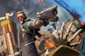 Screenshot of Apex Legends Ballistic holding pistol near the hand of a downed player