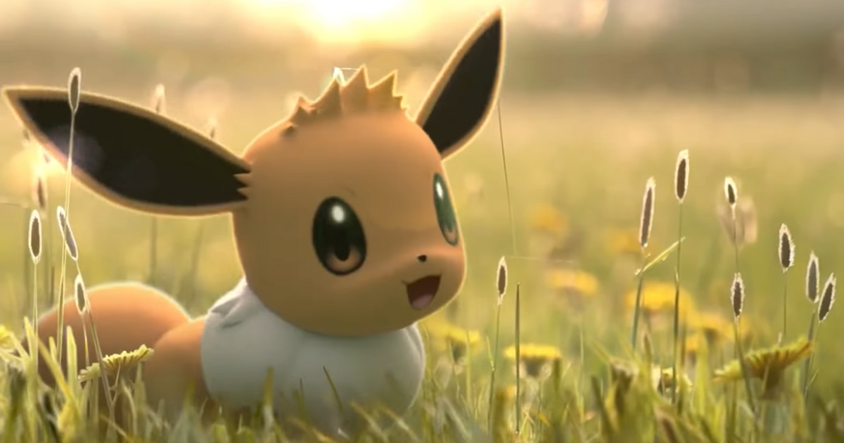 Eevee in Pokemon GO standing in a field of flowers.