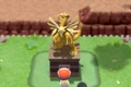 A Pokémon Trainer standing in front of the Dialga legendary statue in Pokémon Brilliant Diamond and Shining Pearl.