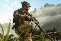 Modern Warfare 3 Captain Price crouching while holding gun