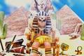 Mega Pyramid Tycoon character in front of pyramids