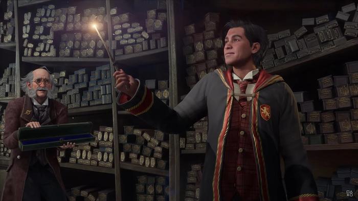 A scene from the Hogwarts Legacy trailer, showing a wizard holding his wand