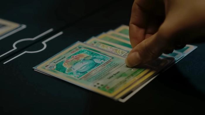 A screenshot of the Pokémon TCG Classic trailer featuring Venusaur card.