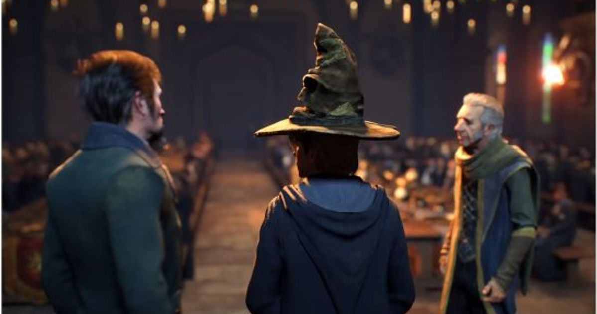Characters stood talking in the main hall in Hogwarts Legacy.