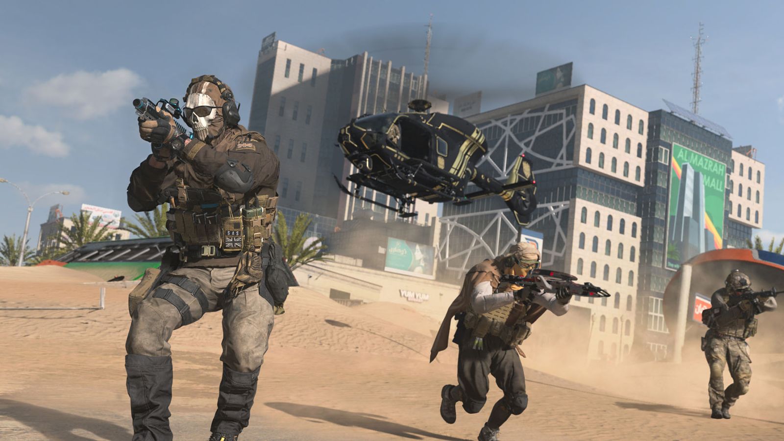 Screenshot of Warzone players walking on sand with helicopter flying in the background