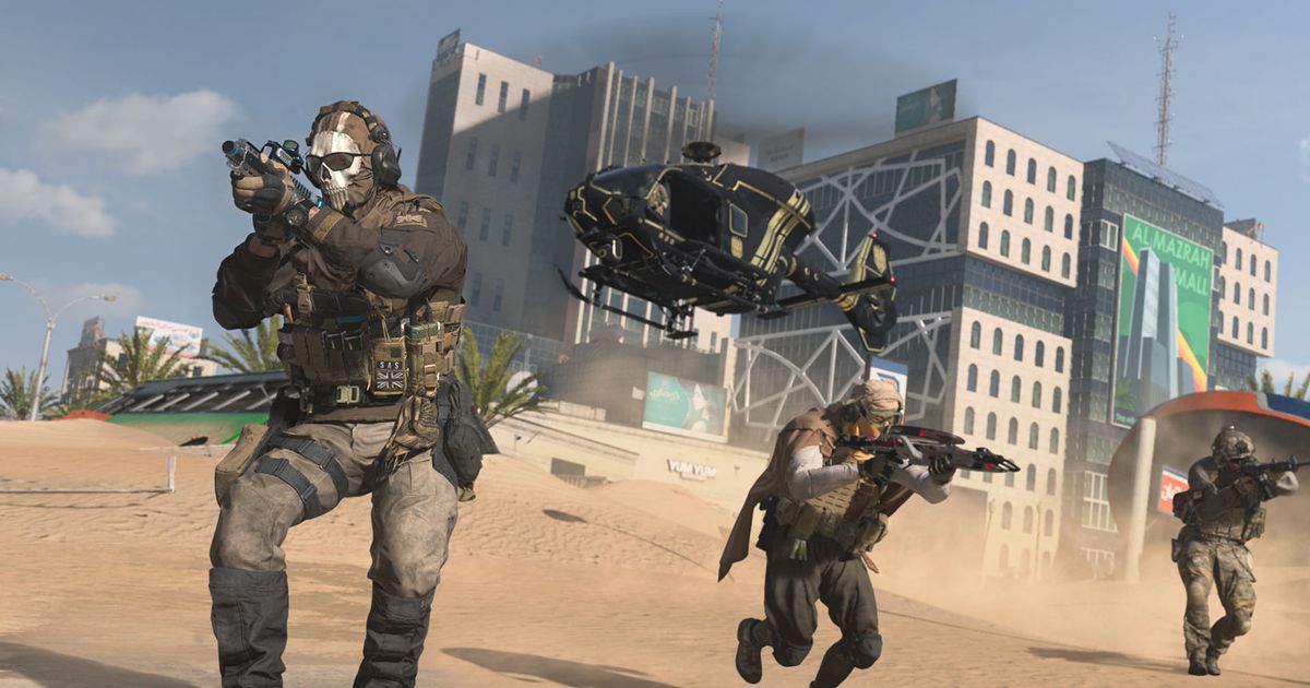 Screenshot of Warzone players walking on sand with helicopter flying in the background