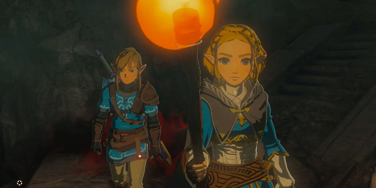 link and zelda with a torch in Tears of the Kingdom