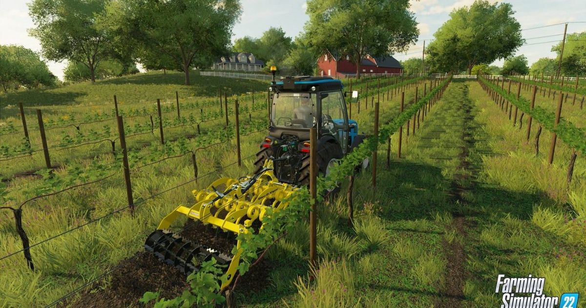 A tractor ploughing a field in Farming Simulator 22.