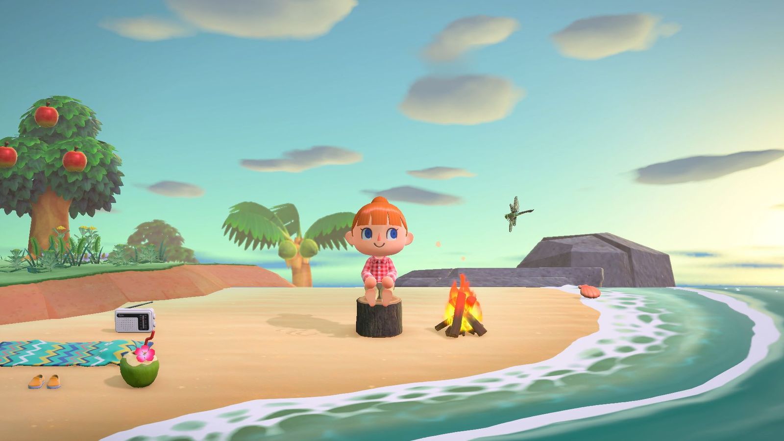 Animal Crossing: New Horizons in-game image of a character with red hair wearing a pink dress sat at the beach.