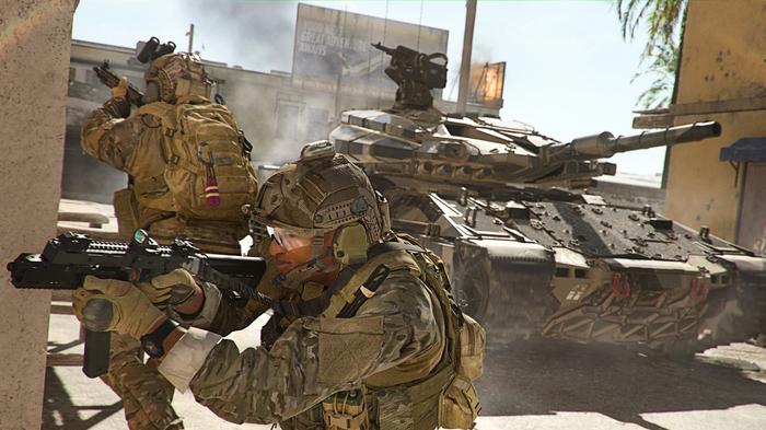 Image showing Modern Warfare 2 players standing near tank