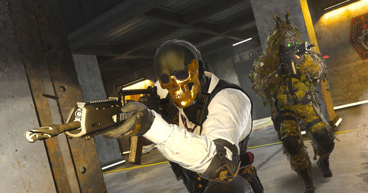 Modern Warfare 3 player wearing gold mask and aiming down sights of gun with player wearing ghillie suit in background