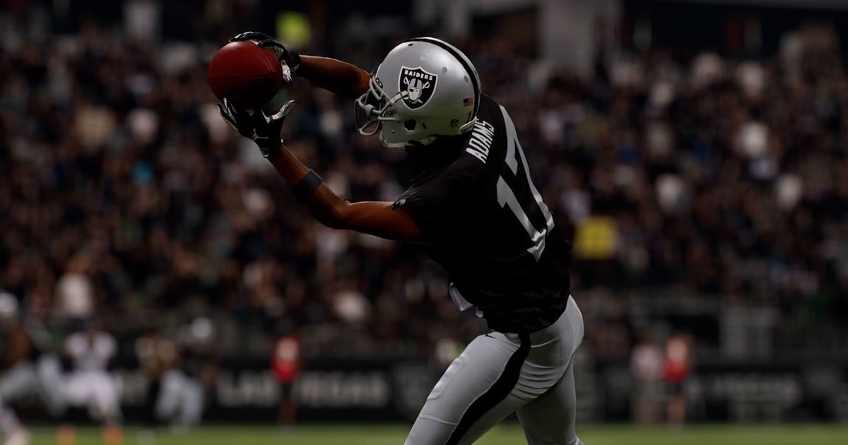 Image showing Las Vegas Raiders player catching football in Madden 23
