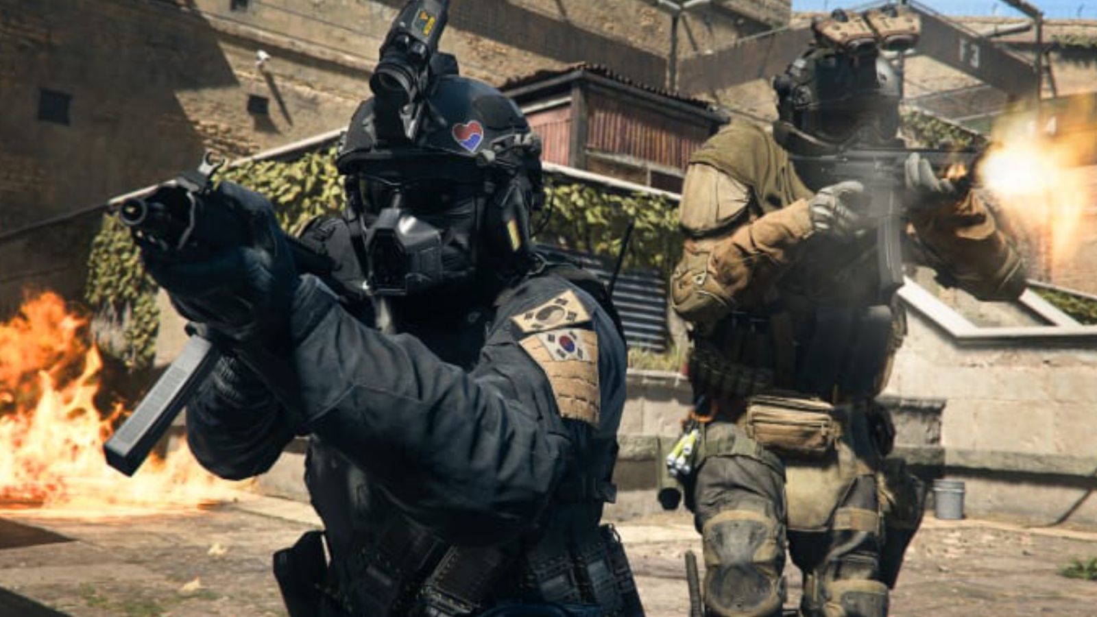 Two soldiers aiming SMGs in Call of Duty: Warzone 