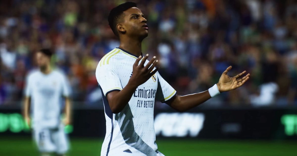 EA Sports FC Rodrygo with his hands raised.