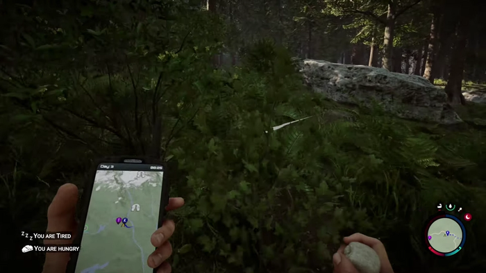 A screenshot of a player looking at their GPS in Sons of the Forest