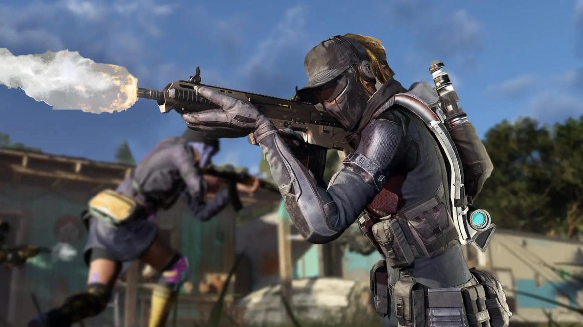 Screenshot of XDefiant player firing assault rifle while aiming down sights