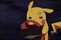 Pikachu is crying and holding Ash's hat